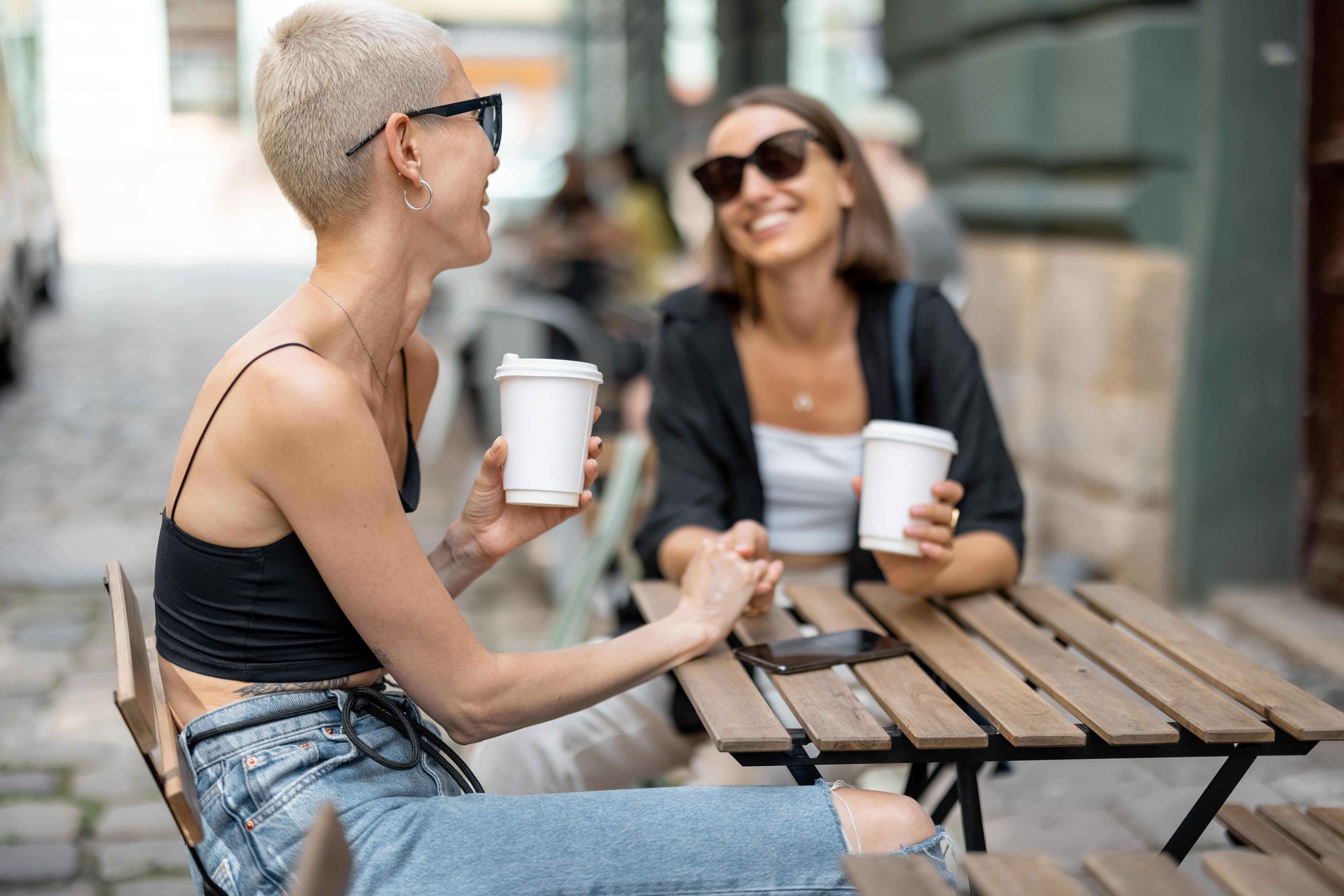 Women drinking coffee on a patio